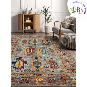 May include: A multi-colored area rug with a geometric pattern in shades of blue, red, yellow, and orange. The rug has a traditional Persian design with intricate details.