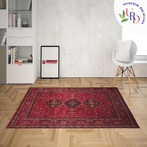 May include: A red, black, and cream patterned rug with a traditional design. The rug has a dark border and a central diamond shape.