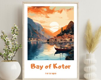 May include: A framed print of a sunset over a bay with a town on the opposite shore. The print is titled "Bay of Kotor, Montenegro".