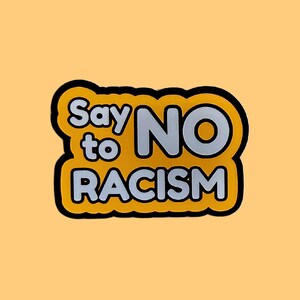 May include: A sticker with the words "Say No to Racism" in white and grey lettering, outlined in black, set against a yellow background. The sticker has a black border and is on an orange background.