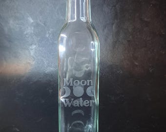 Oppsies tall moon water storage jar. witches storage glass etched jar