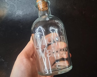 Oppsies rounded moon water jar. witches glass storage