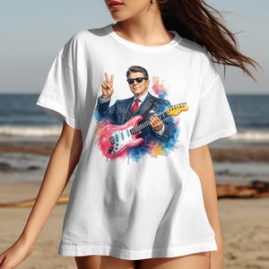 Ronald Reagan in a suit playing a pink guitar with a peace sign.
