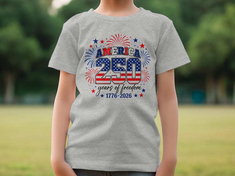 Gray t-shirt with "America 250 years of freedom 1776-2026" text.
