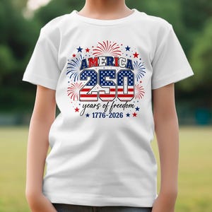 White t-shirt with "America 250 1776-2026" and fireworks graphic.