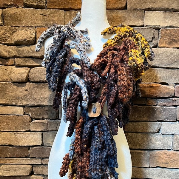 A rare find!  Look like a Designer when you wear this handknit, fun, one of a kind scarf!  Handmade, chunky knit, great Christmas gift.