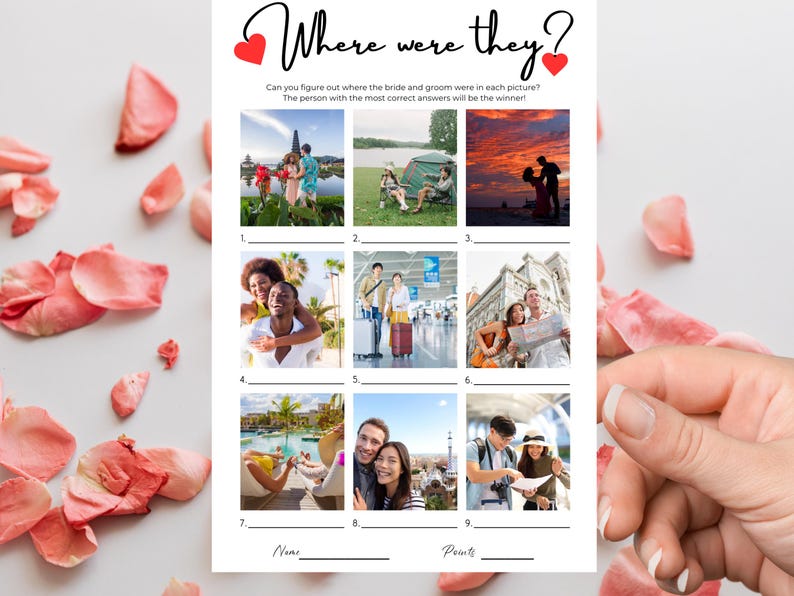 May include: A white paper game card titled Where were they? with two red hearts. It features nine numbered photo squares showing couples in various travel locations, with blank lines for answers, and spaces for Name and Points at the bottom.
