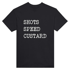 May include: Black t-shirt with white text that reads "SHOTS SPEED CUSTARD".