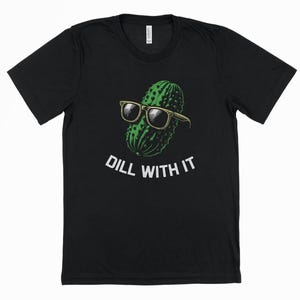 a black t - shirt with a green cactus wearing sunglasses