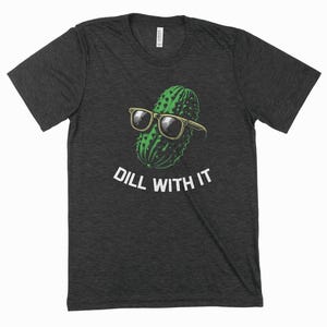 a black t - shirt with a green cactus wearing sunglasses
