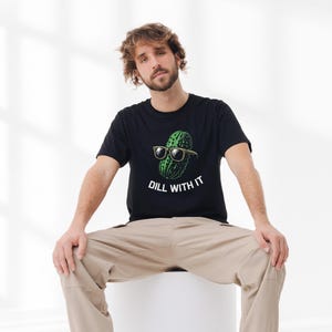 a man sitting on top of a white stool