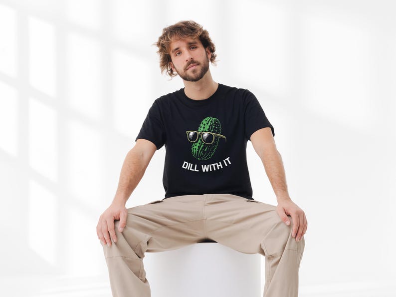 a man sitting on top of a white stool