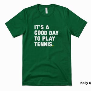a green t - shirt that says it's a good day to play tennis