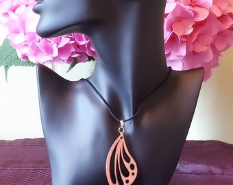 1. 5&quot; x 2.5&quot; inch gorgeously detailed...laser cut butterfly wing pendant...hand decorated in traditional cherry wood tone.
