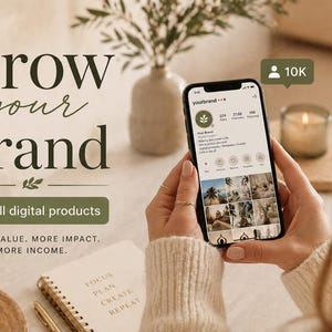 May include: An iPhone displays a social media profile with a nature-themed logo. The image includes the text "Grow your brand" and "Sell digital products." A cup of coffee, a notebook, and a lit candle are also visible.