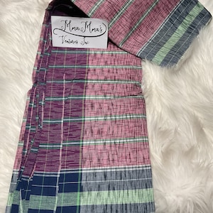 May include: A pink, purple, blue, and green plaid fabric with a white tag that reads "Mama Mama's Ventures Inc."