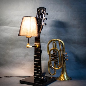 Guitar Neck Table Lamp - Rustic Loft-Style Lighting for Music Lovers.