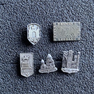A set of five badges from the USSR era: the cities of Central Asia, Kishinev, Brest, Sivash.