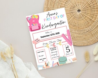 May include: A pink and white printable first day of kindergarten sign with a backpack, pencils, scissors, and a ruler. The sign says "Anna's First Day of Kindergarten" and "Today is September 12th, 2028".