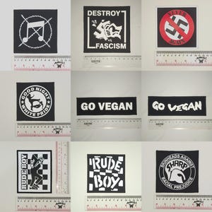 Patch com símbolo anti-música, patch "Destrua o fascismo", patch anti-nazista, patch "Seja vegano", patch com slogan, patch "Ska Skank", patch "Rude Boy", patch afiado