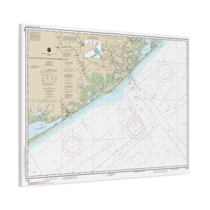 May include: A rectangular nautical chart titled San Luis Pass to East Matagorda Bay, Texas. The map features detailed coastal topography, depth soundings in feet, navigational markers, and compass roses printed in black, blue, tan, and green ink.