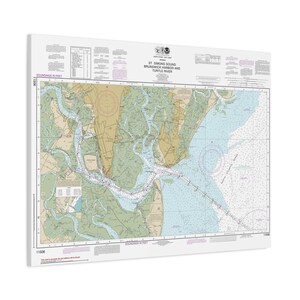 May include: A nautical chart of St. Simons Sound, Brunswick Harbor, and Turtle River. The map features detailed depictions of the coastline, waterways, and depth soundings in feet. The chart includes text and various symbols.