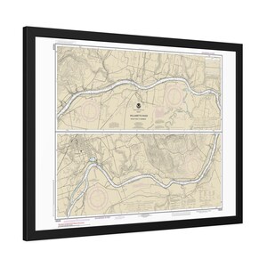 May include: A framed nautical chart of the Willamette River, featuring detailed topographical and navigational information. The chart is divided into two sections, with a black frame and white matting. The map includes contour lines, depth soundings, and navigational aids.