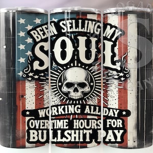 May include: A stainless steel tumbler with a black and red American flag design. The text "Been Selling My Soul Working All Day Overtime Hours For Bullshit Pay" is printed on the tumbler.