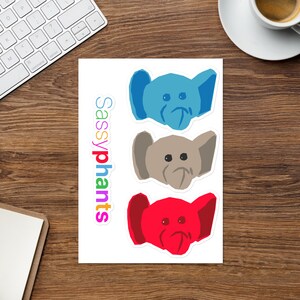 May include: Three colorful elephant stickers with the text "Sassyphants" in rainbow letters. The elephants are blue, gray, and red.