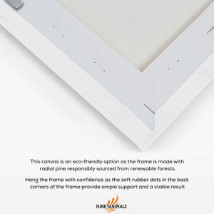 May include: Close-up of a white canvas frame corner, showing the back with staples and the canvas stretched over the wooden frame. The text says the frame is made with radial pine from renewable forests.