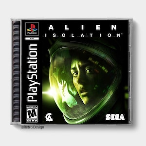 May include: A PlayStation game case for "Alien: Isolation." The cover features a woman in a space helmet with a green-tinted visor. The game title is in white block letters. The PlayStation logo and "SEGA" are also visible.