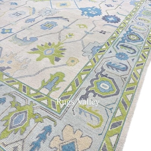 Hand-Knotted Turkish Oushak Rug: Muted Floral Wool Area Rug, 8x10