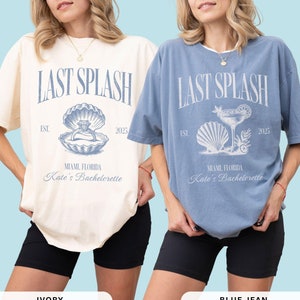 May include: Two oversized t-shirts, one ivory and one blue jean, each with a distressed "LAST SPLASH" graphic. The ivory shirt features a seashell with a ring, while the blue jean shirt has a cocktail. Both say "Miami, Florida, Kate's Bachelorette" and "2025".