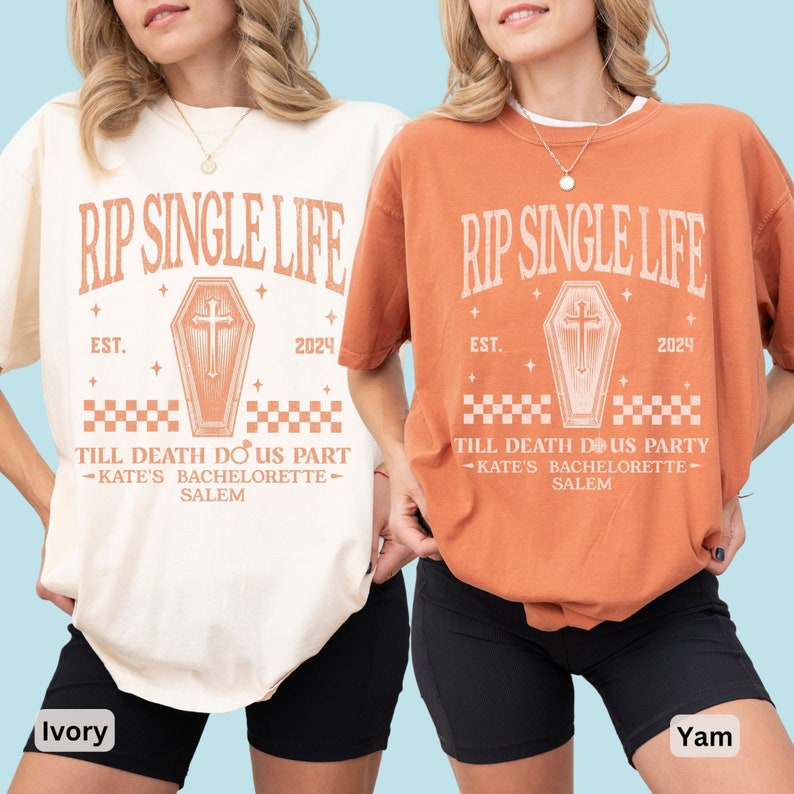 May include: Two oversized t-shirts, one cream and one terracotta, display the text "RIP SINGLE LIFE" above a coffin graphic with a cross. The text "TILL DEATH DO US PART - KATE'S BACHELORETTE - SALEM" and the year 2024 are also visible.