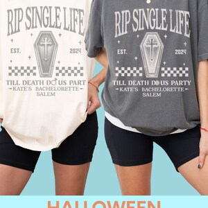 May include: Two t-shirts, one cream and one grey, with the text "RIP SINGLE LIFE" above a coffin graphic. The text "EST. 2024" and "TILL DEATH DO US PART - KATE'S BACHELORETTE - SALEM" are also printed on the shirts. The bottom of the image reads "HALLOWEEN BACHELORETTE T-SHIRTS".