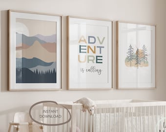 May include: Three framed prints for a nursery or child's room. The prints feature a mountain range, the words "Adventure is calling", and a forest scene with a sun.
