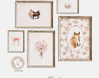 May include: Set of five watercolor prints featuring a horse, saddle, flowers, and a bow. The prints are framed in a rustic wood frame and have a pink and white color scheme. The prints are labeled "Little Budgie Kids & Home".