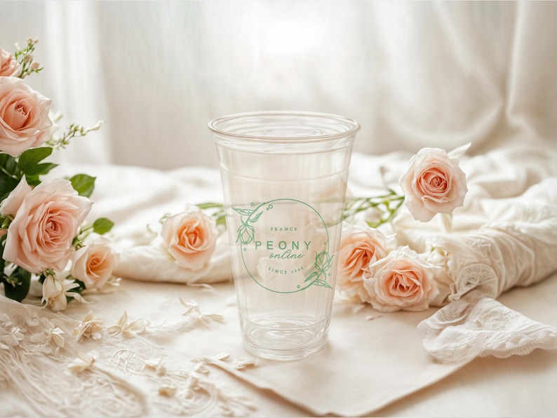 May include: A clear plastic cup with a logo that says "PEONY online France since 1991" surrounded by pink roses.