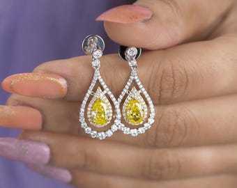 Pear-Shaped 3.47tcw Yellow Lab Diamond Double Halo Drop Earrings | IGI Certified