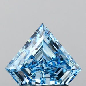 May include: A faceted, light blue gemstone with a kite-like shape. The gem has many facets that reflect light, creating a sparkling effect. The gemstone is set against a neutral background.
