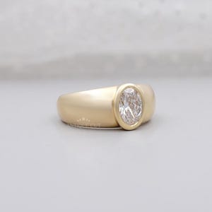 Yellow gold oval bezel diamond ring IGI certified