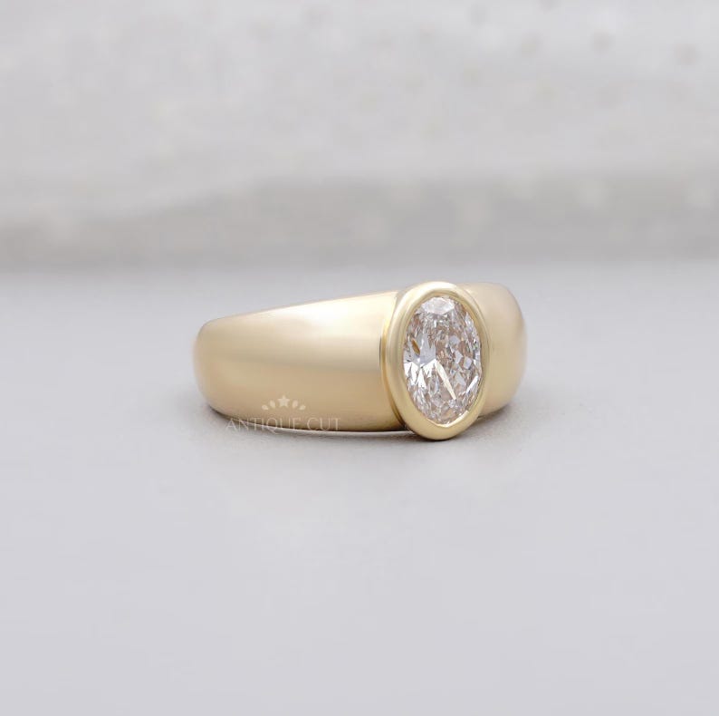 Yellow gold oval bezel diamond ring IGI certified
