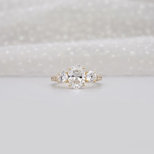2.40tcw Oval & Round Lab-Grown Diamond Ring | Three-Stone Trellis Setting | IGI Certified