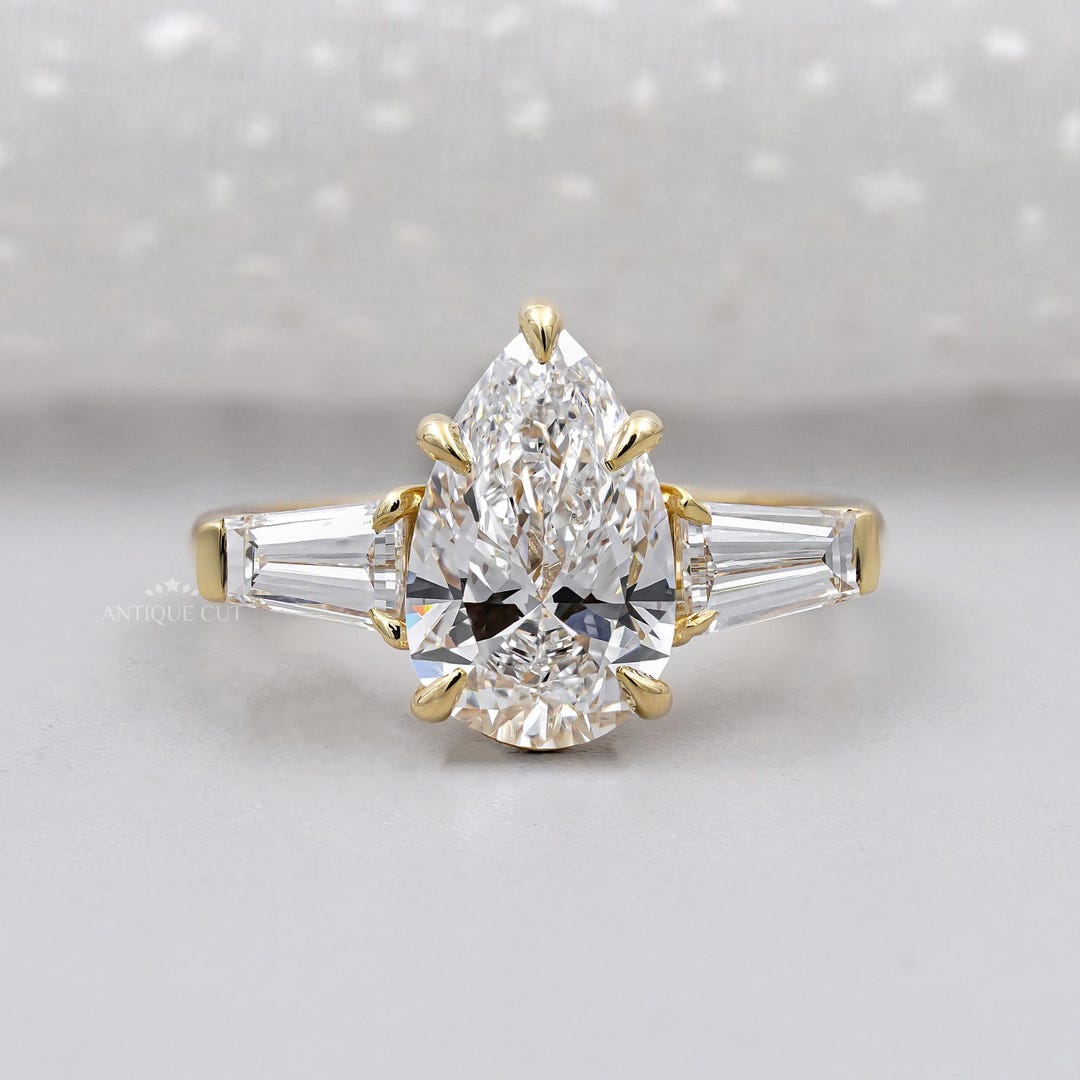 Three Stone Pear Engagement Ring With Tapered Baguette Side Stones ...