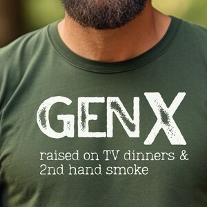 May include: A green t-shirt with white text that reads "GENX raised on TV dinners & 2nd hand smoke".