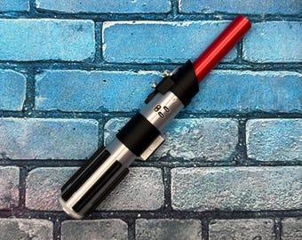Rekwizyt do cosplayu w kształcie miecza świetlnego inspirowanego Darthem Vaderem ze składanym ostrzem (drukowany w 3D)