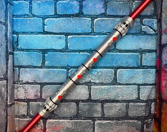 Spada laser ispirata a Darth Maul con lama pieghevole (stampata in 3D)