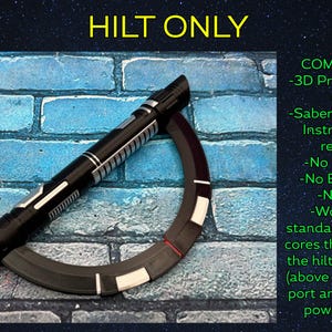 May include: A black and silver lightsaber hilt with a curved, segmented ring. The text "HILT ONLY" is at the top. The image includes details about the hilt, including that it is 3D printed and works with standard lightsaber cores.