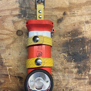Inverted Flashlight Holder by Practical Fire Solutions