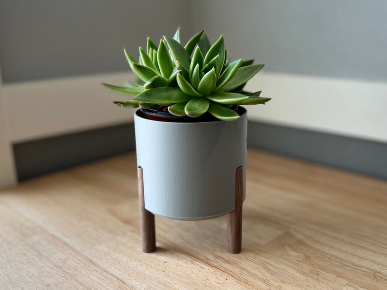 Midcentury modern round planter to fit 3-4" round-pot planted succulents or other plants. Gray, white, black, silver.